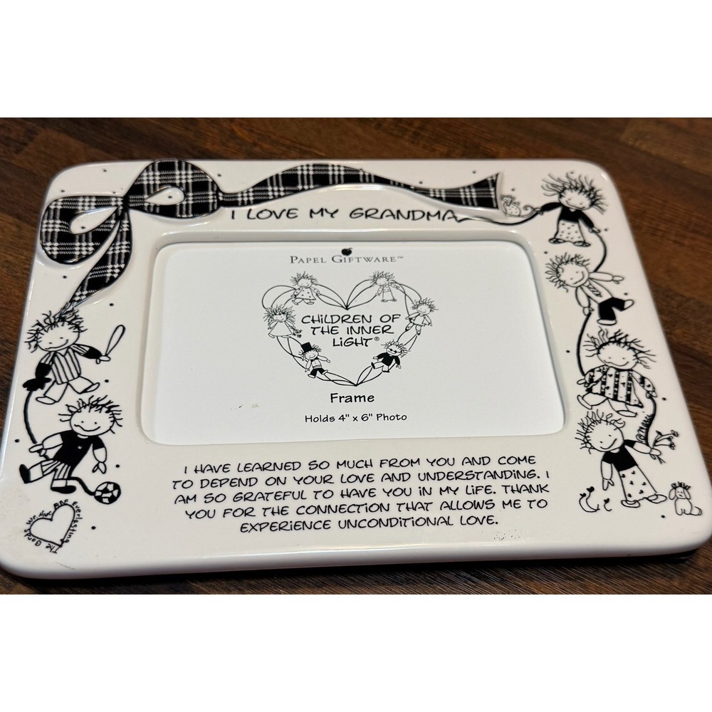 I love my grandma ceramic picture frame. Holds 4X6 picture. Papel giftware.